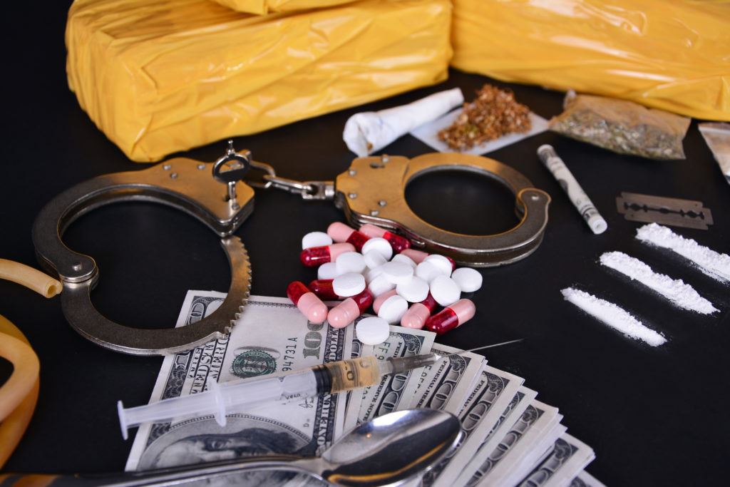 Drug Paraphernalia and Handcuffs